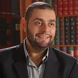 Poet and novelist Ayman Otoom; PhD in Arabic Literature 2007