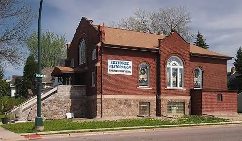 Exterior front and side view of building