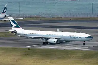 An Airbus A330-343 (B-LBB) with the We are flying the 1000th A330 special livery decal