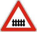 А32 Level crossing with barriers ahead