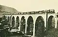 BT opening train with own and SBB passenger cars on the Glatt valley viaduct near Herisau