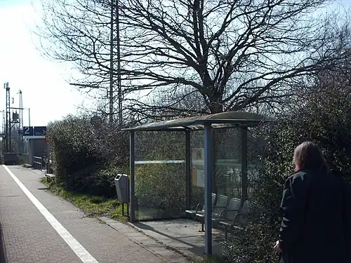 Asphalt platform with small shelter