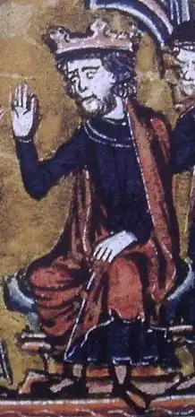 A seated Baldwin wears his crown