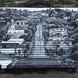 Bench at the top, painted to match the street