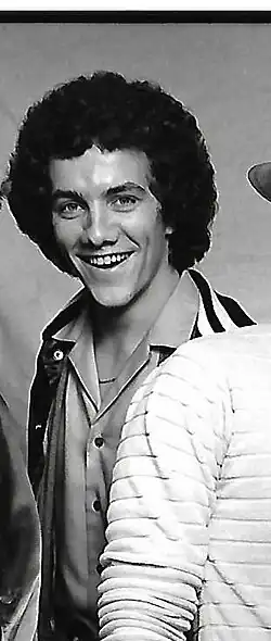 A black-and-white photograph of Tim Menzies