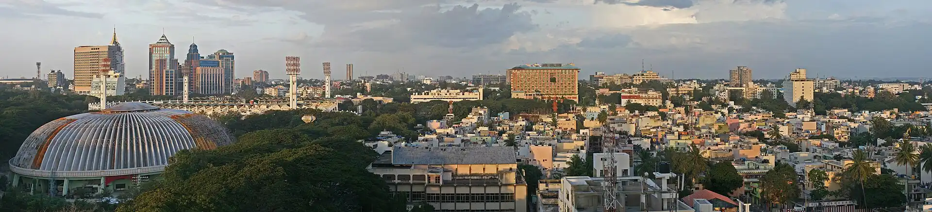A panorama of Bangalore, the centre of India's software development economy. In the 1980s, when the first multinational corporations began to set up centres in India, they chose Bangalore because of the large pool of skilled graduates in the area, in turn due to the many science and engineering colleges in the surrounding region.[297]