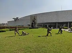 Green field and statues
