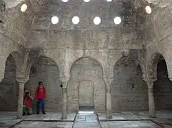 The warm room or central room (bayt al-wasṭānī) of the bathhouse