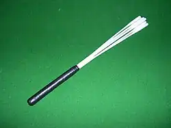 Modern plastic brush-ended beater