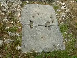 Base of the pilasters of the cella.