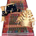 The traditional clothing of the Batak Angkola consists of ulos godang, ampu, and bulang.