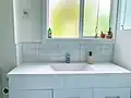 Bathroom sink backsplash