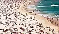 The beach, with numerous sunbathers