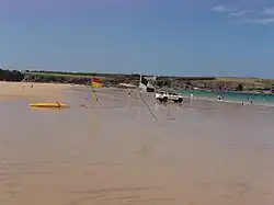 Beach lifeguards and swimming-surfing areas at Harlyn Bay, just north of St Merryn