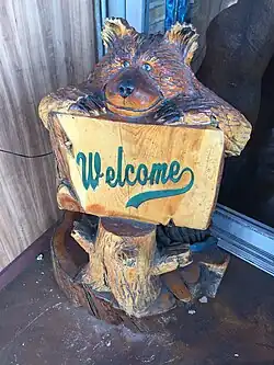 Bear sculpture greets customers at the restaurant entryway