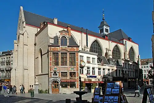 The Church of St. Nicholas and the small houses leaning against its side façade