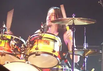 Gillies performing in 2007 with Silverchair