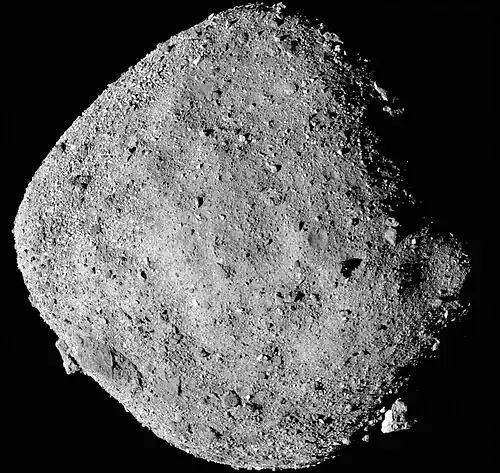 Image 20 101955 Bennu Photograph credit: NASA / OSIRIS-REx 101955 Bennu is a carbonaceous asteroid discovered by the Lincoln Near-Earth Asteroid Research project in 1999. Bennu has a roughly spheroidal shape, an effective diameter of about 484 m (1,588 ft), and a rough, boulder-strewn surface. It is a potentially hazardous object, with a cumulative 1-in-2,700 chance of impacting Earth between 2175 and 2199. It is named after the Bennu, an ancient Egyptian bird deity associated with the Sun, creation, and rebirth. This mosaic image of Bennu consists of twelve PolyCam images taken by NASA's OSIRIS-REx spacecraft from a range of 24 km (15 mi). The primary goal of the mission is to collect a sample from the asteroid's surface, which is scheduled to take place on October 20, 2020, and return the sample to Earth for analysis. More selected pictures