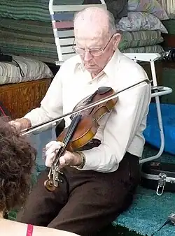 Benton Flippen playing the fiddle in 2009