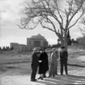 Mordechai Ish-Shalom and Yitzhak Ben-Zvi standing across from Heichal Shlomo, 1959