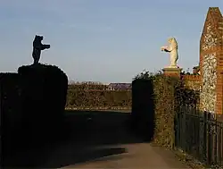 Statues of two bears at the entrance to Bentworth Hall