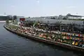 People relaxing on deckchairs at the River Spree near Berlin Hauptbahnhof, Berlin 2007