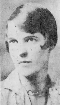 A young white woman with dark hair cut in a short bob