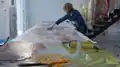 Beverly Barkat working in her studio, in Jerusalem.