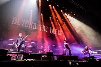 Beyond the Black performing at Arena Leipzig in 2023