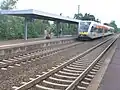 GTW 2/6 coupled set towards Friedberg stops in Hanau Nord
