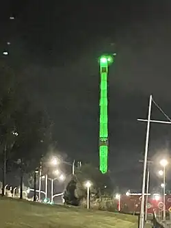 The "Big Cigar" monument in Churchill town centre with its lights turned on.