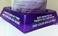Product originally labeled in English; bilingual warning base added for any hospital visitors & workers who are Spanish-dominant.