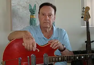 Pitman with his Gibson ES-330 guitar in 2012