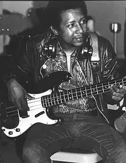 Cox playing a Fender Precision Bass c.&nbsp;late&nbsp;1960s