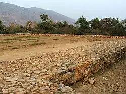Bimbisara's jail, where King Bimbisara was imprisoned by his son Ajatashatru, in Rajgir.