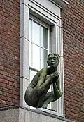 Birdy (bronze), 1997. Height 122&nbsp;cm. Perched on the windowsill of 3, Crescent Hall, Mount Street, Dublin.