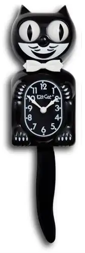 A newer black model clock displays four paws.