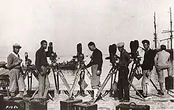 Behind the scenes photo, cameramen and cameras