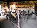 Inside the blacksmith's hut