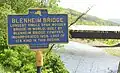 Old Blenheim Bridge NYS Education Dept. Historical Marker (with bridge in background) as photographed 29 May 2009