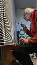 Youri Messen-Jaschin painting Blue Two in his Lausanne studio (2020). The artwork belongs to a private collection.