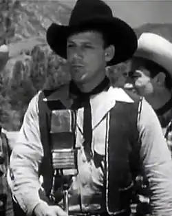 Bob Nolan in Lights of Old Santa Fe (1944)