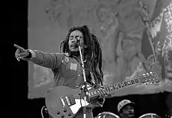 Reggae music rose to worldwide prominence in the 1970s, led by artists such as Bob Marley (pictured), Peter Tosh, and Jimmy Cliff, spreading Jamaican musical styles and Rastafari culture internationally.