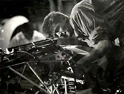 A young Bob Wallace working on a Maserati Birdcage, early 1960s