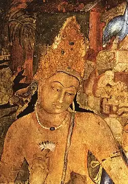 The Bodhisattva of compassion Padmapani with lotus.[137][139]