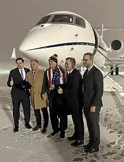 Adam Boehler, Secretary Rubio, Steve Witkoff, and Mike Waltz welcome Marc Fogel upon his return to the United States at Joint Base Andrews.