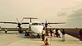 An aircraft parked at the apron