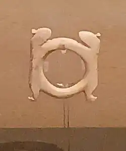 Bone finger ring with two opposite rampant lions (Naqada grave 1480, Naqada IIA).[89]