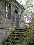 The altered steps up to the entrance.