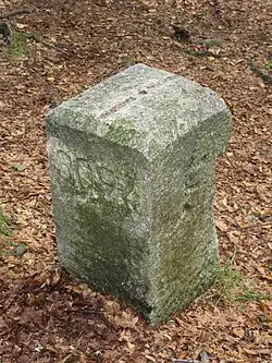 Boundary marker indicating the former border between France and Germany during the German occupation of Alsace-Lorraine (1871-1918).